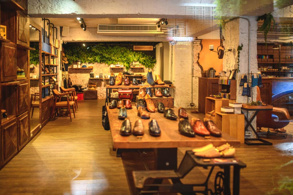 Shoe store with exposed brick and greenery